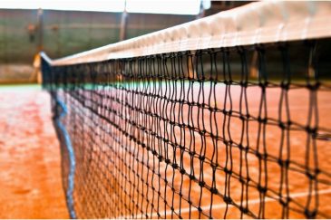 Can You Touch The Net In Tennis? (Definitive Rule On Net-Touching)