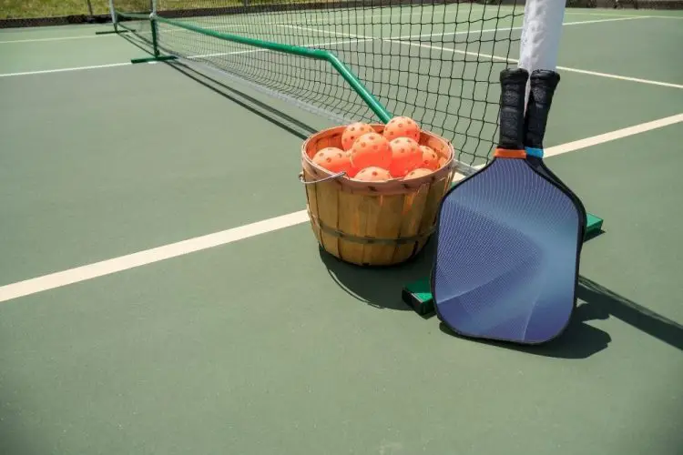 Pickle ball and racket