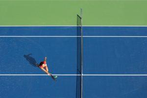 What Is A Half Volley In Tennis? (How To Hit It & When To Use It)